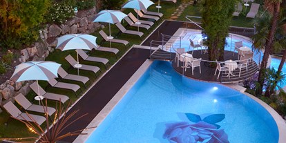 Hotels am See - Italien - 37 / 5000
Risultati della traduzione
Schwimmbad mit beheiztem Whirlpool. - Belfiore Park Hotel