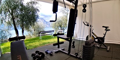 Hotels am See - Italien - Um fit zu bleiben, haben wir ein anständiges Fitnessstudio in unserem Garten. Die wichtigsten Werkzeuge für Ihr körperliches Wohlbefinden finden Sie hier.  - Hotel Eden Gardasee