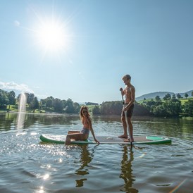 Urlaub am See: Stand-up-paddeln am Ritzensee (Leihboards verfügbar!) - Ritzenhof - Hotel und Spa am See